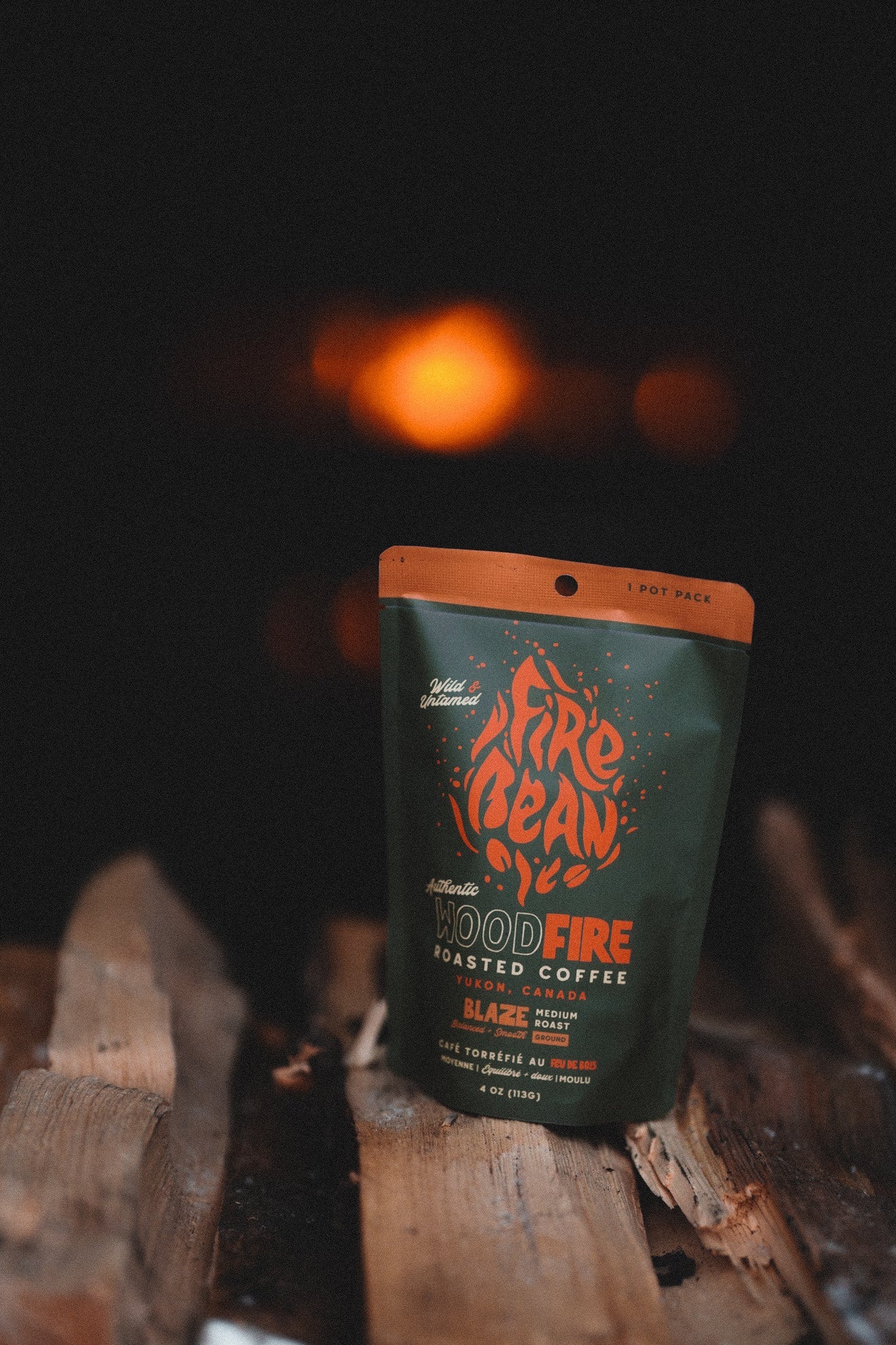 Firebean Bag on a Stack of wood