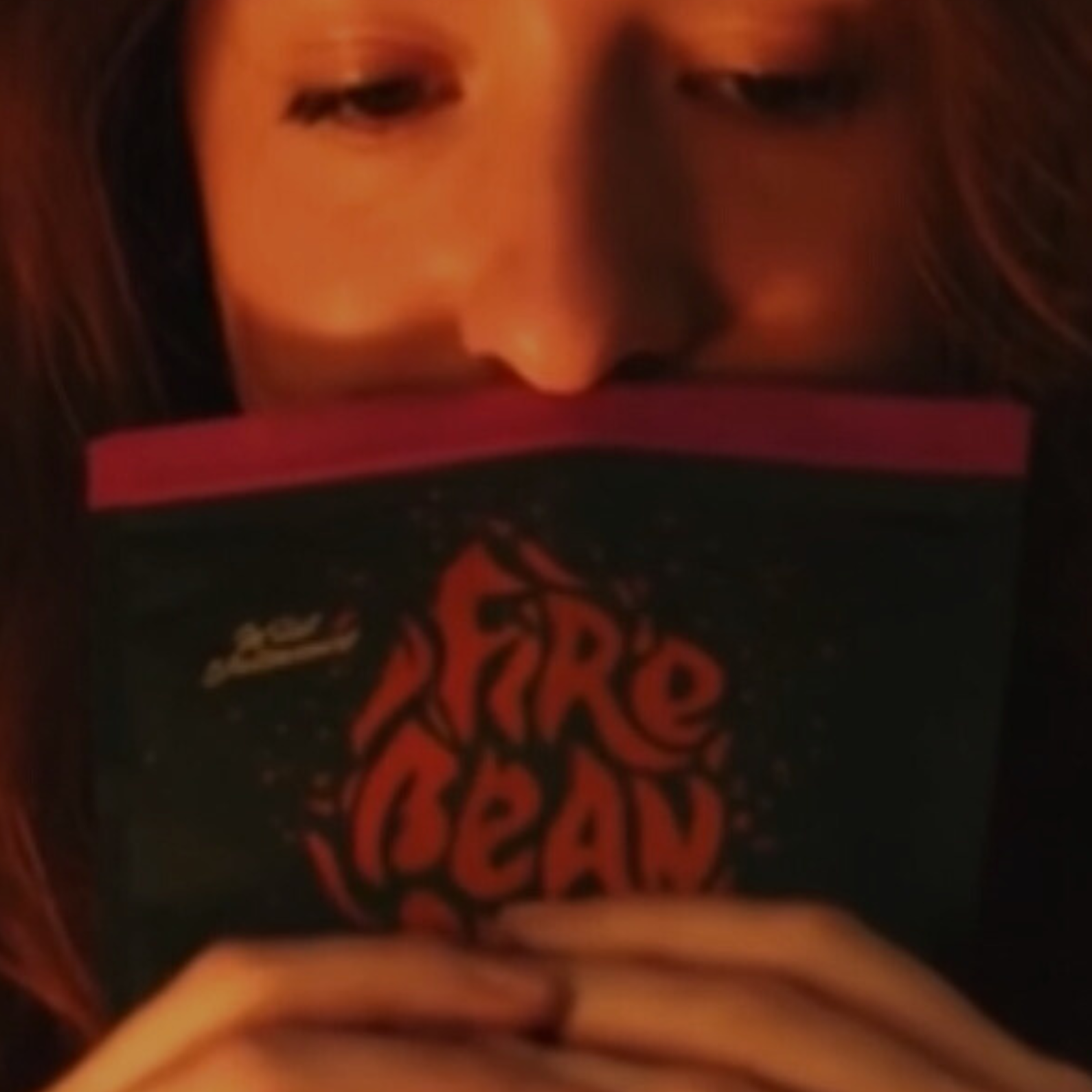 Person holding a bag of fiebean coffee